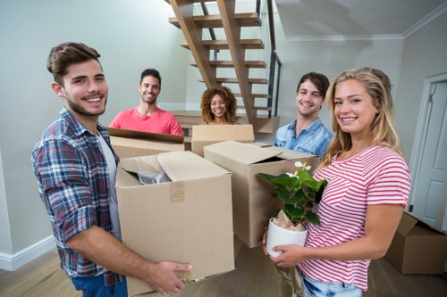 Removal van service loading household items in Morden