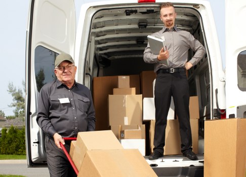 Man And Van Morden team sorting recyclable items during a local move