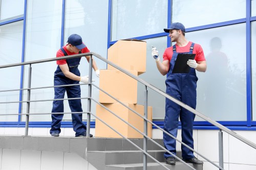 Flat removals team preparing items for a Morden apartment move