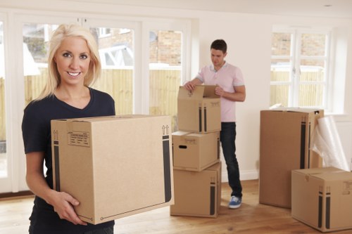 Loading furniture and boxes for an urgent move in Morden