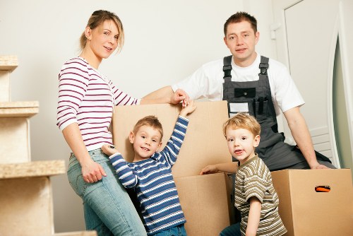Student moving day with boxes, desk, and mattress prepared for transport