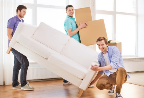 Packed boxes and furniture prepared for house removals in Morden