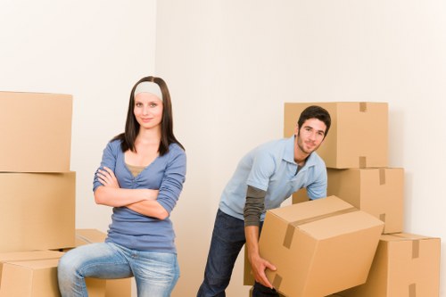 Packing materials and organised boxes for a home move in Morden