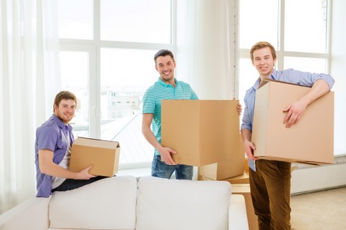 Careful wrapping of fragile household items during packing service