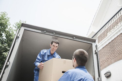 Packed office boxes and furniture ready for a commercial move